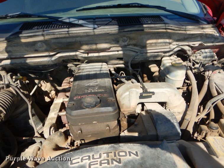 image for item FC9756 2003 Dodge Ram 3500 Quad Cab flatbed pickup truck