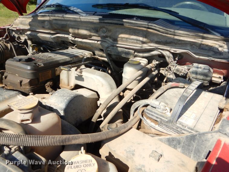 image for item FC9756 2003 Dodge Ram 3500 Quad Cab flatbed pickup truck