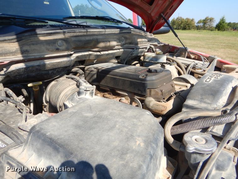 image for item FC9756 2003 Dodge Ram 3500 Quad Cab flatbed pickup truck