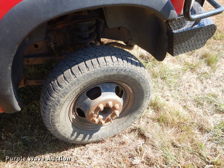 image for item FC9756 2003 Dodge Ram 3500 Quad Cab flatbed pickup truck