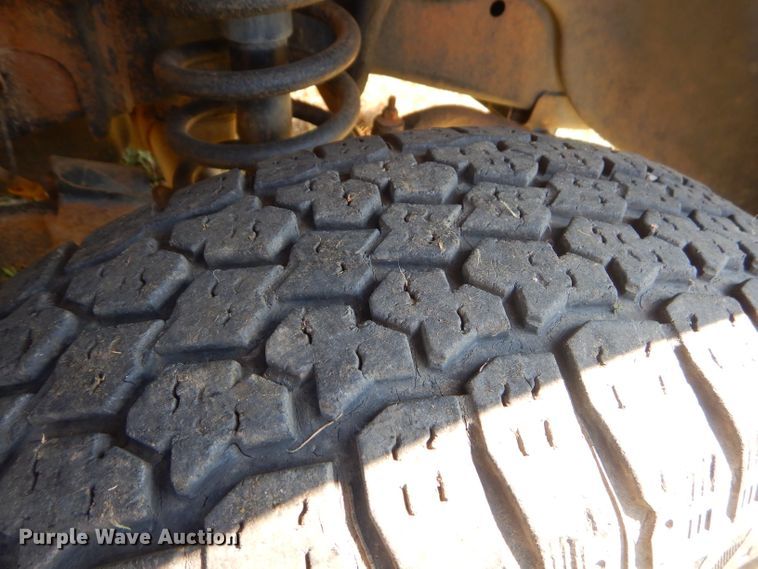 image for item FC9756 2003 Dodge Ram 3500 Quad Cab flatbed pickup truck