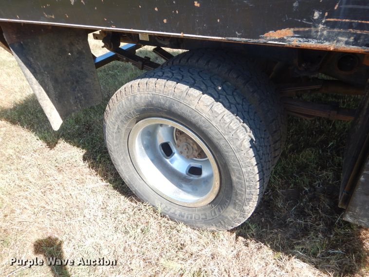 image for item FC9756 2003 Dodge Ram 3500 Quad Cab flatbed pickup truck