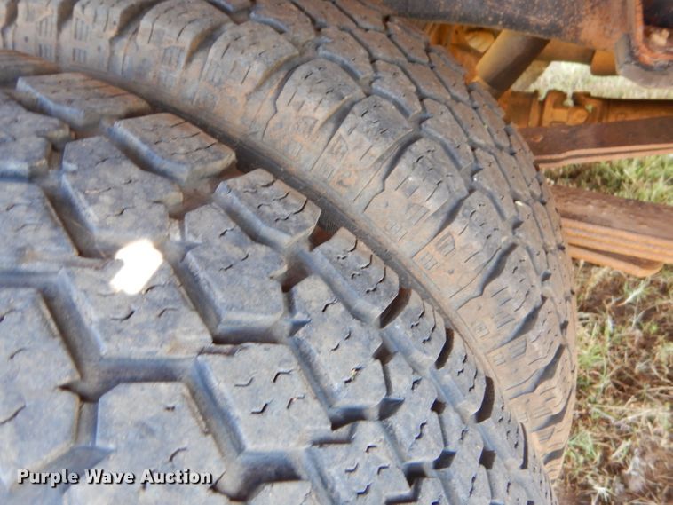 image for item FC9756 2003 Dodge Ram 3500 Quad Cab flatbed pickup truck