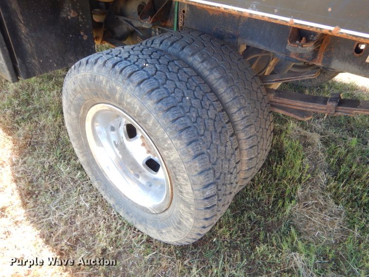 image for item FC9756 2003 Dodge Ram 3500 Quad Cab flatbed pickup truck