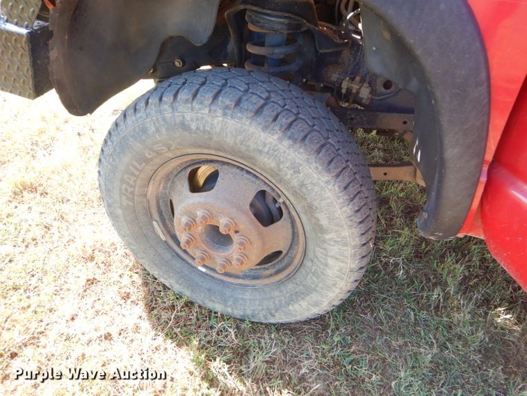 image for item FC9756 2003 Dodge Ram 3500 Quad Cab flatbed pickup truck