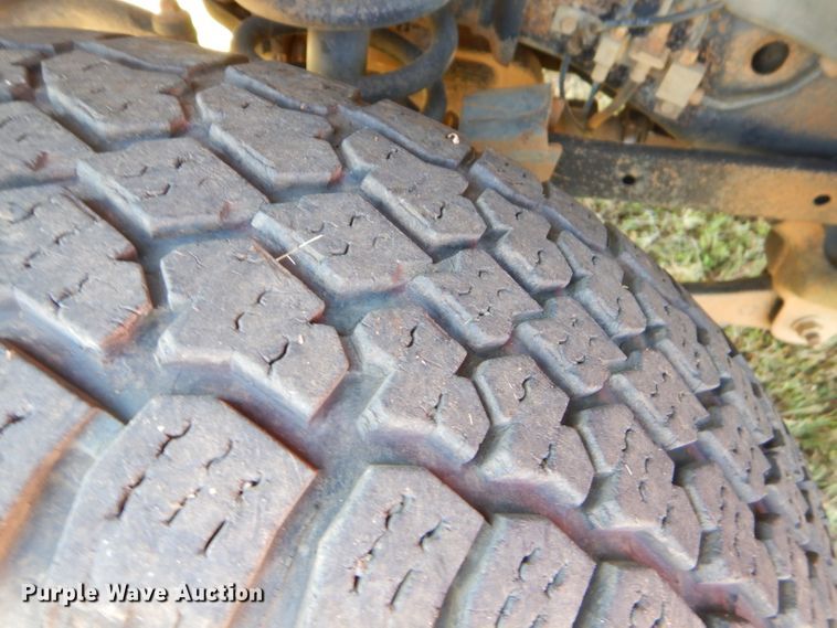 image for item FC9756 2003 Dodge Ram 3500 Quad Cab flatbed pickup truck