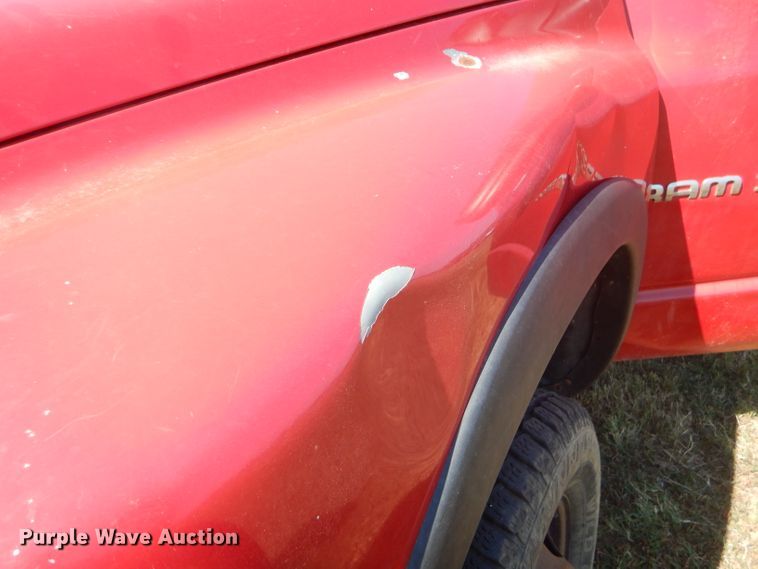 image for item FC9756 2003 Dodge Ram 3500 Quad Cab flatbed pickup truck