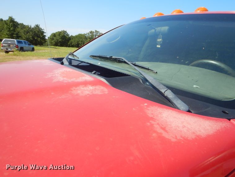 image for item FC9756 2003 Dodge Ram 3500 Quad Cab flatbed pickup truck