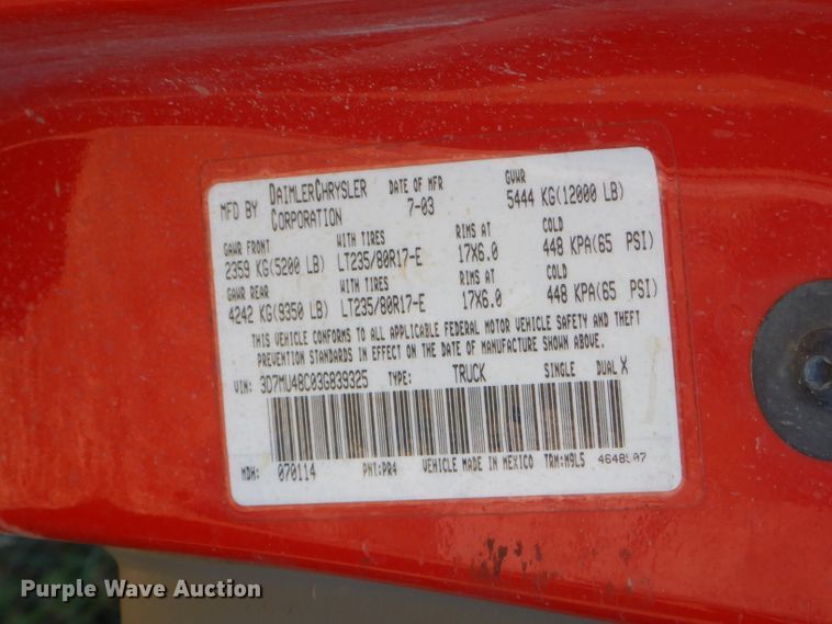 image for item FC9756 2003 Dodge Ram 3500 Quad Cab flatbed pickup truck