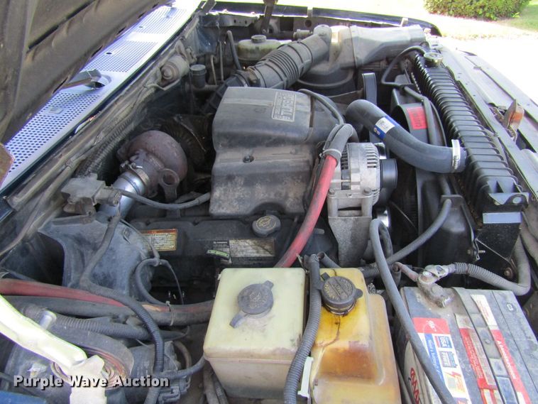 image for item FD9258 1992 Ford F450 Super Duty rollback truck