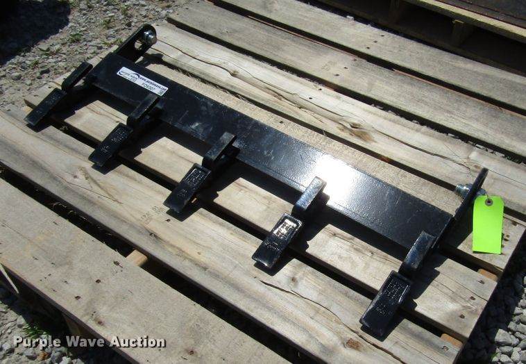 Skid steer bolton tooth bar in Olathe, KS Item FO9307 sold Purple Wave