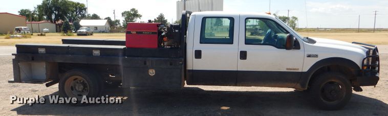 image for item FY9691 2004 Ford F350 Super Duty XLT Crew Cab utility bed pickup truck