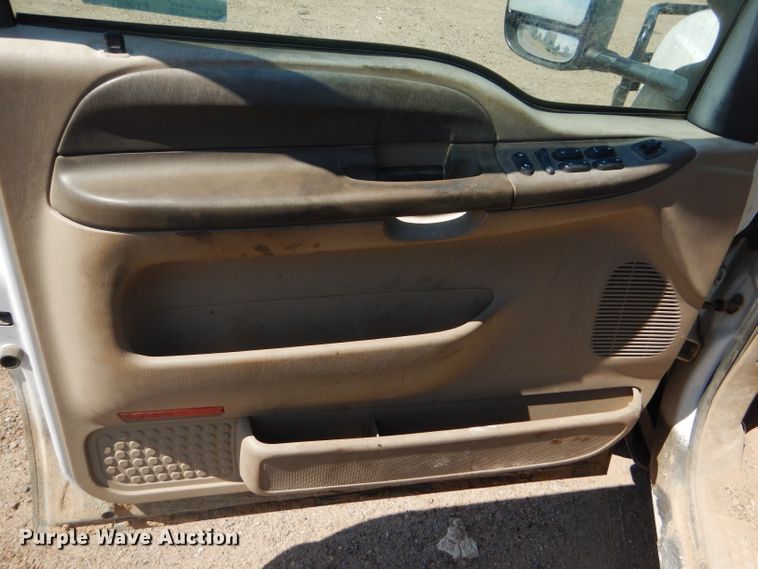 image for item FY9691 2004 Ford F350 Super Duty XLT Crew Cab utility bed pickup truck