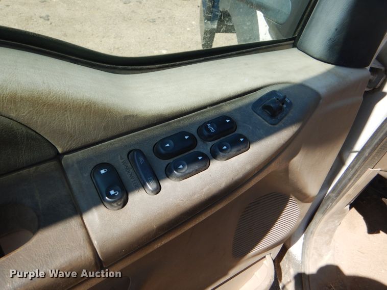 image for item FY9691 2004 Ford F350 Super Duty XLT Crew Cab utility bed pickup truck