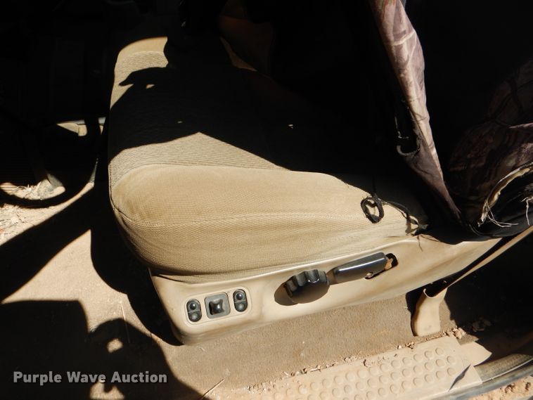 image for item FY9691 2004 Ford F350 Super Duty XLT Crew Cab utility bed pickup truck