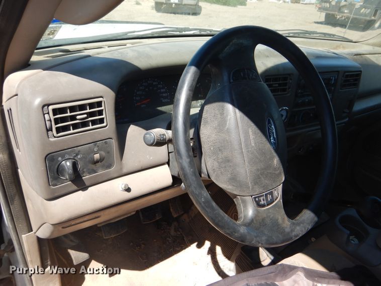 image for item FY9691 2004 Ford F350 Super Duty XLT Crew Cab utility bed pickup truck