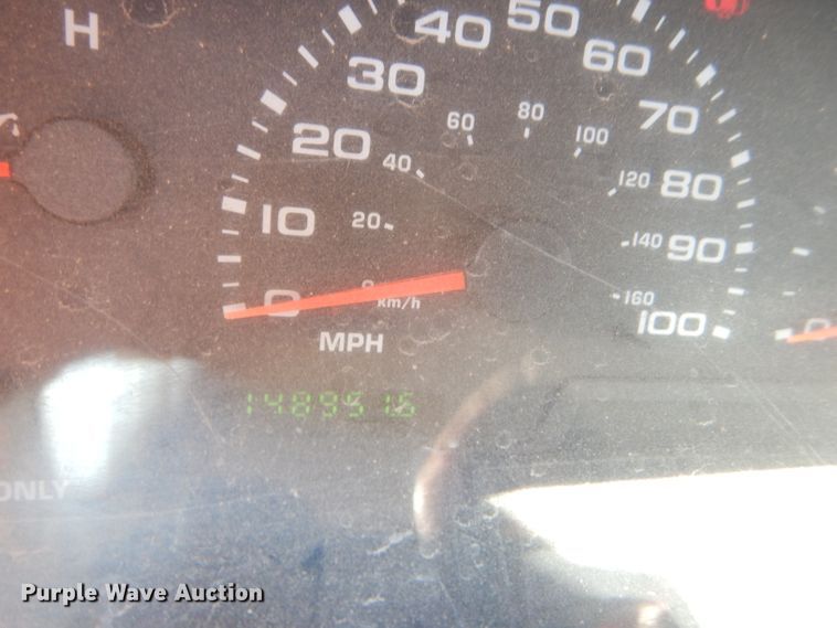 image for item FY9691 2004 Ford F350 Super Duty XLT Crew Cab utility bed pickup truck