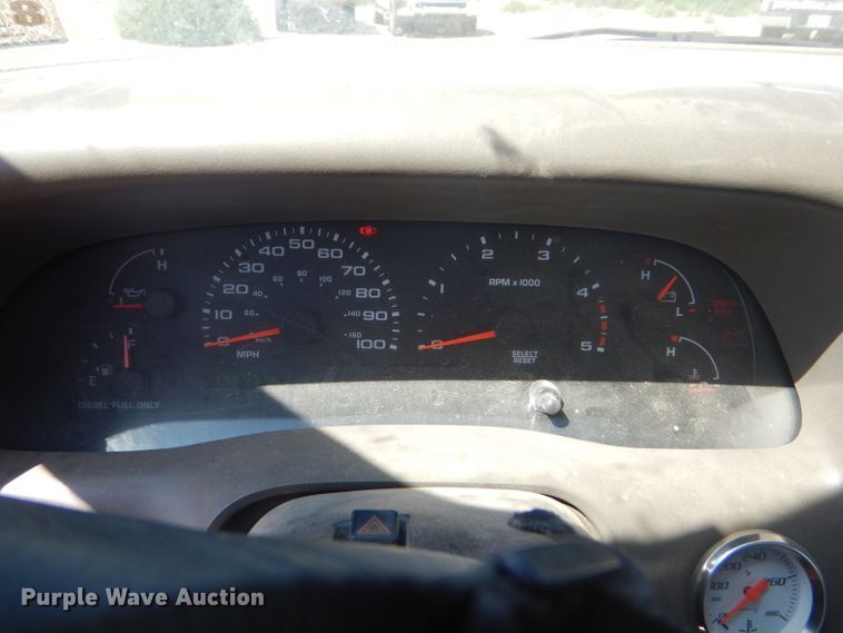 image for item FY9691 2004 Ford F350 Super Duty XLT Crew Cab utility bed pickup truck