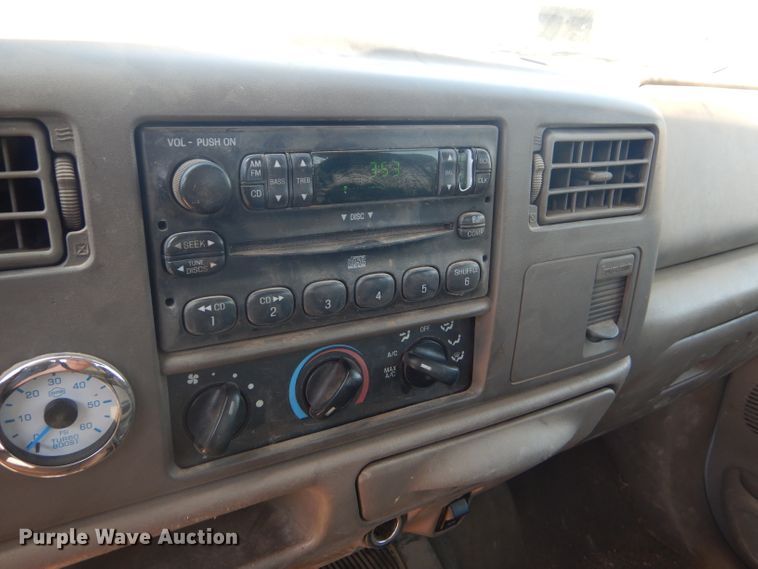 image for item FY9691 2004 Ford F350 Super Duty XLT Crew Cab utility bed pickup truck