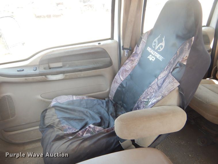 image for item FY9691 2004 Ford F350 Super Duty XLT Crew Cab utility bed pickup truck