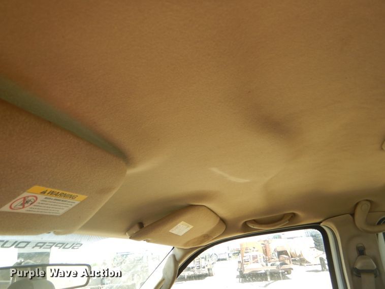 image for item FY9691 2004 Ford F350 Super Duty XLT Crew Cab utility bed pickup truck