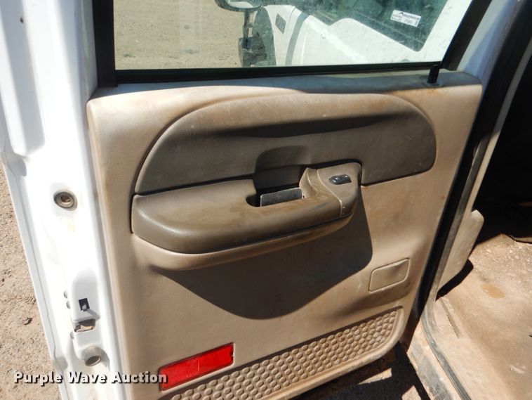 image for item FY9691 2004 Ford F350 Super Duty XLT Crew Cab utility bed pickup truck