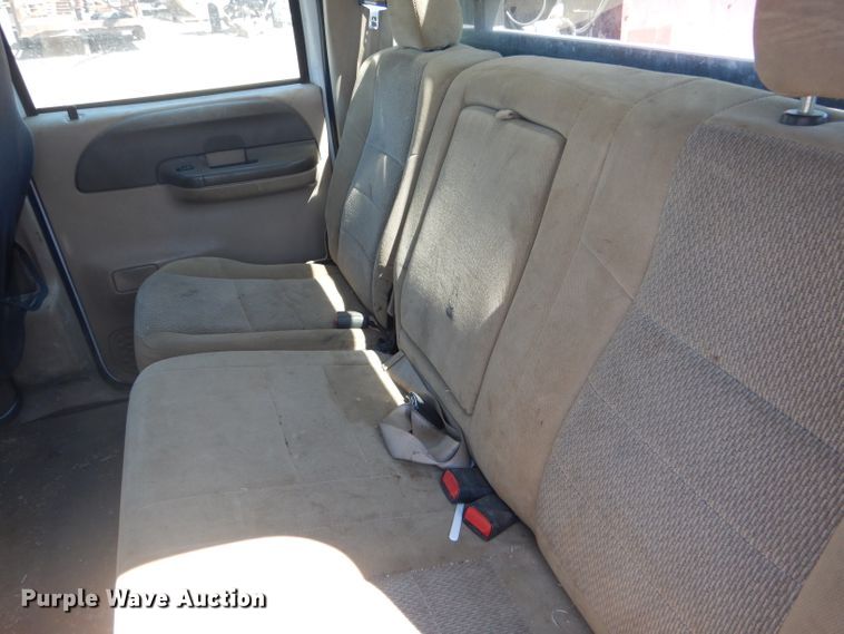 image for item FY9691 2004 Ford F350 Super Duty XLT Crew Cab utility bed pickup truck