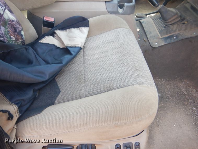 image for item FY9691 2004 Ford F350 Super Duty XLT Crew Cab utility bed pickup truck