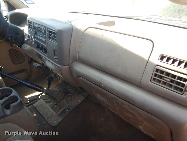 image for item FY9691 2004 Ford F350 Super Duty XLT Crew Cab utility bed pickup truck