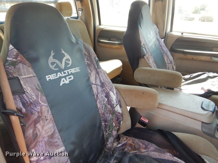 image for item FY9691 2004 Ford F350 Super Duty XLT Crew Cab utility bed pickup truck