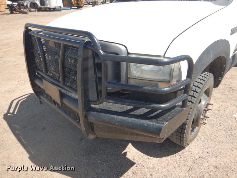 image for item FY9691 2004 Ford F350 Super Duty XLT Crew Cab utility bed pickup truck