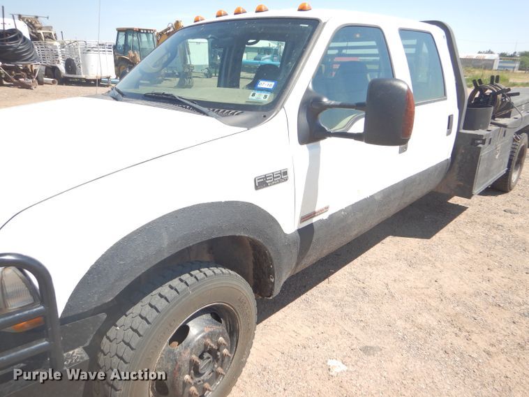 image for item FY9691 2004 Ford F350 Super Duty XLT Crew Cab utility bed pickup truck