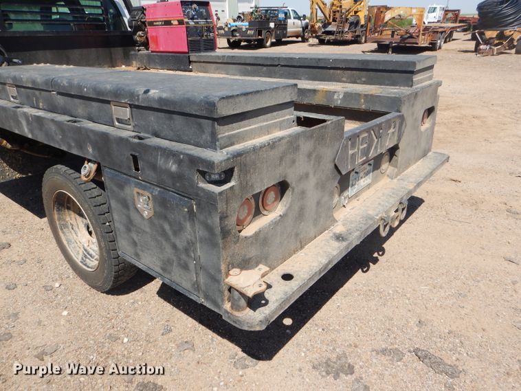 image for item FY9691 2004 Ford F350 Super Duty XLT Crew Cab utility bed pickup truck