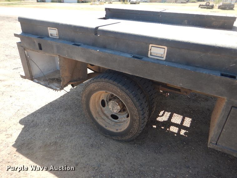 image for item FY9691 2004 Ford F350 Super Duty XLT Crew Cab utility bed pickup truck