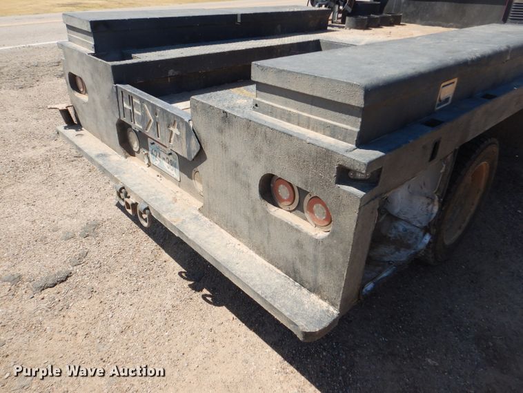 image for item FY9691 2004 Ford F350 Super Duty XLT Crew Cab utility bed pickup truck