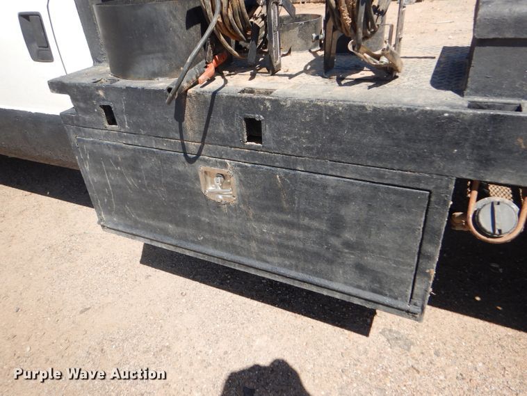 image for item FY9691 2004 Ford F350 Super Duty XLT Crew Cab utility bed pickup truck