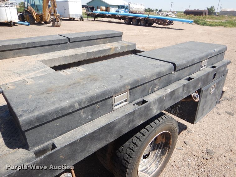 image for item FY9691 2004 Ford F350 Super Duty XLT Crew Cab utility bed pickup truck