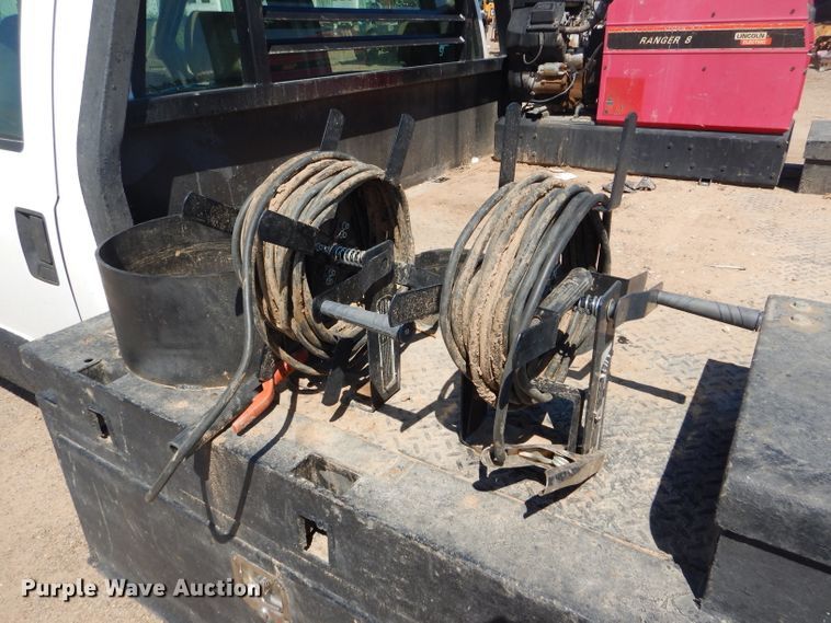 image for item FY9691 2004 Ford F350 Super Duty XLT Crew Cab utility bed pickup truck