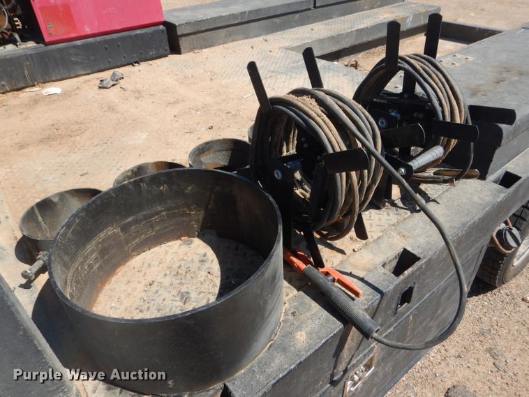 image for item FY9691 2004 Ford F350 Super Duty XLT Crew Cab utility bed pickup truck