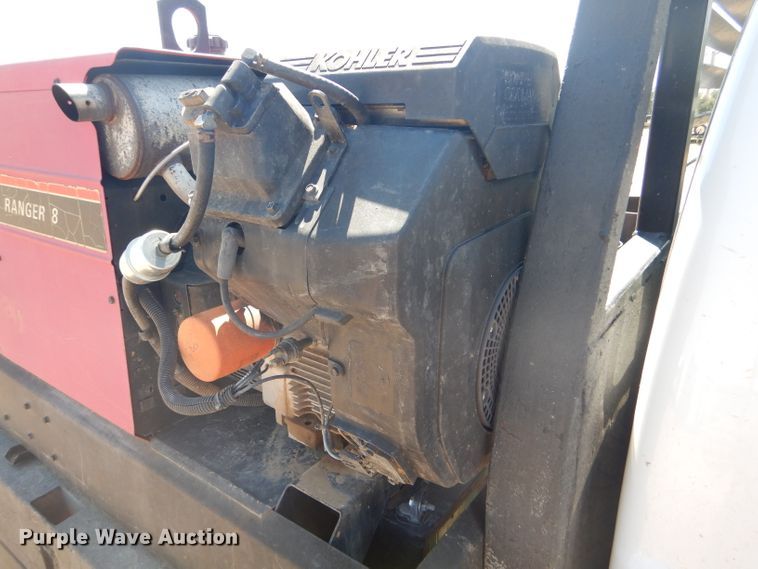 image for item FY9691 2004 Ford F350 Super Duty XLT Crew Cab utility bed pickup truck