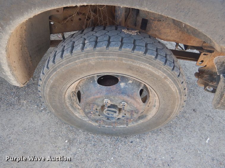 image for item FY9691 2004 Ford F350 Super Duty XLT Crew Cab utility bed pickup truck