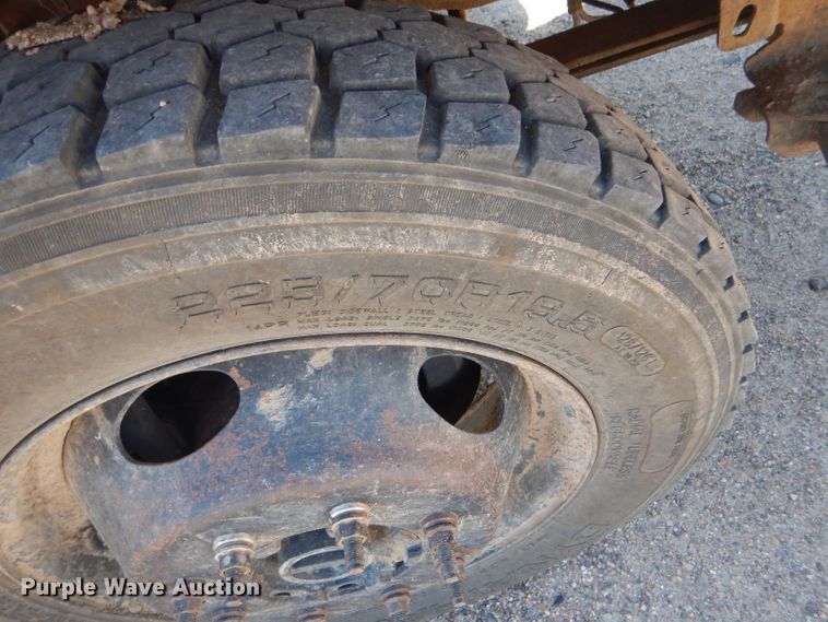 image for item FY9691 2004 Ford F350 Super Duty XLT Crew Cab utility bed pickup truck