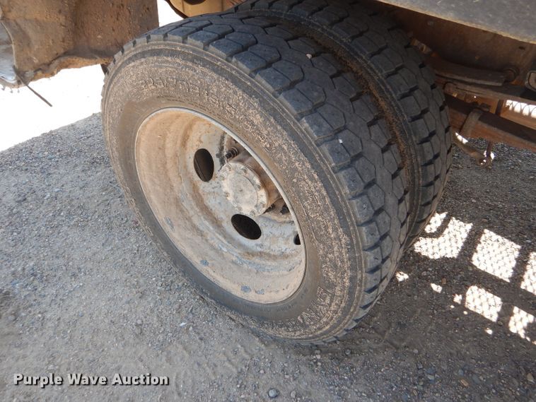 image for item FY9691 2004 Ford F350 Super Duty XLT Crew Cab utility bed pickup truck