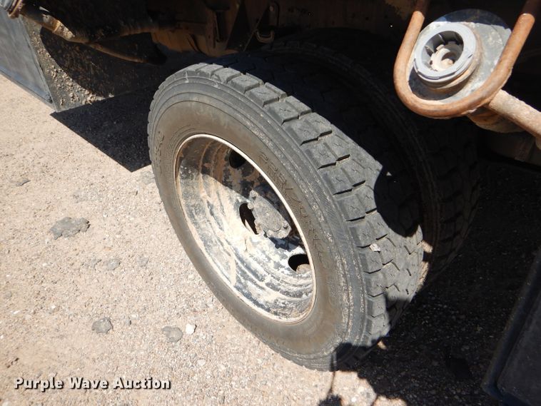 image for item FY9691 2004 Ford F350 Super Duty XLT Crew Cab utility bed pickup truck