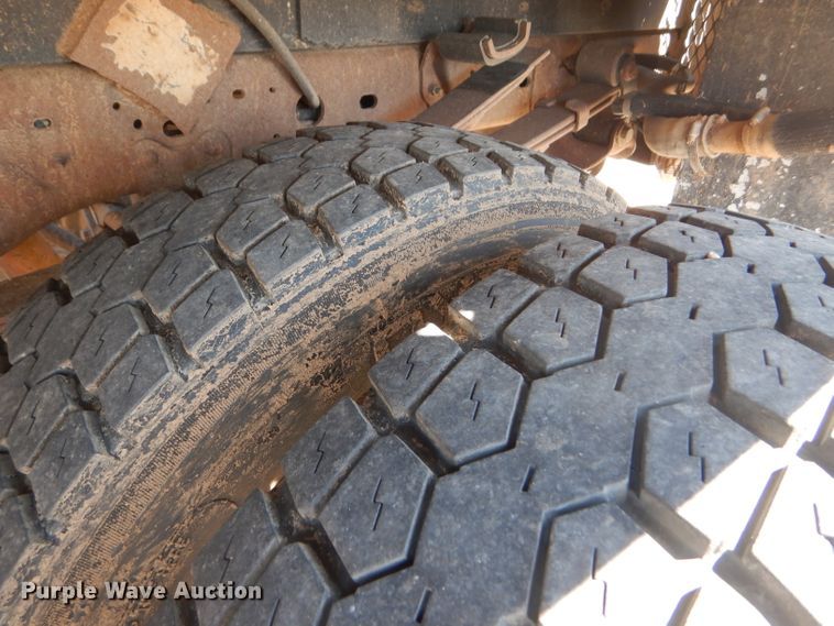 image for item FY9691 2004 Ford F350 Super Duty XLT Crew Cab utility bed pickup truck