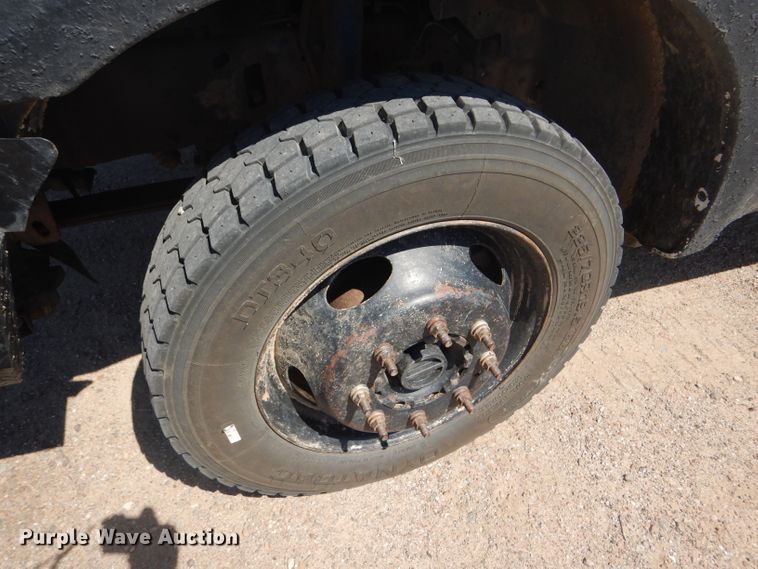 image for item FY9691 2004 Ford F350 Super Duty XLT Crew Cab utility bed pickup truck