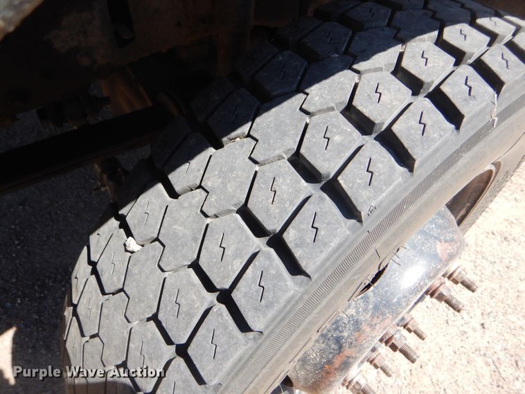 image for item FY9691 2004 Ford F350 Super Duty XLT Crew Cab utility bed pickup truck