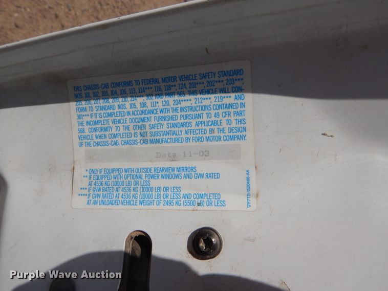 image for item FY9691 2004 Ford F350 Super Duty XLT Crew Cab utility bed pickup truck