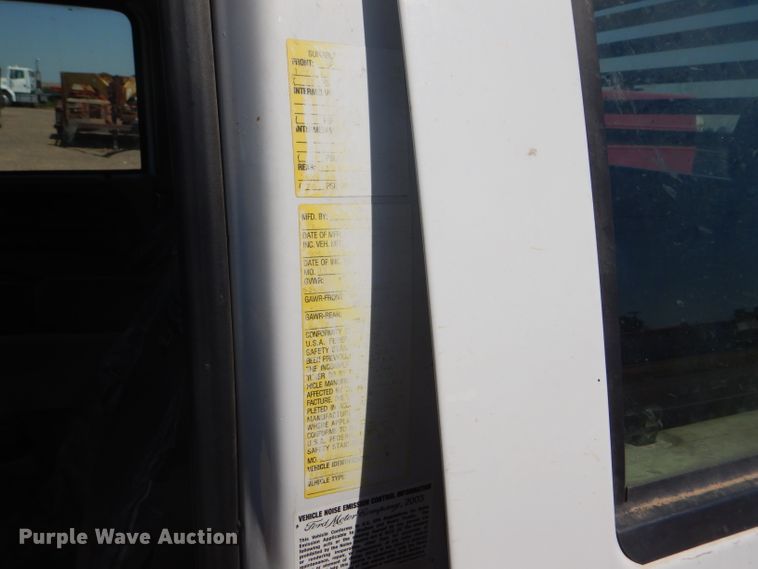 image for item FY9691 2004 Ford F350 Super Duty XLT Crew Cab utility bed pickup truck