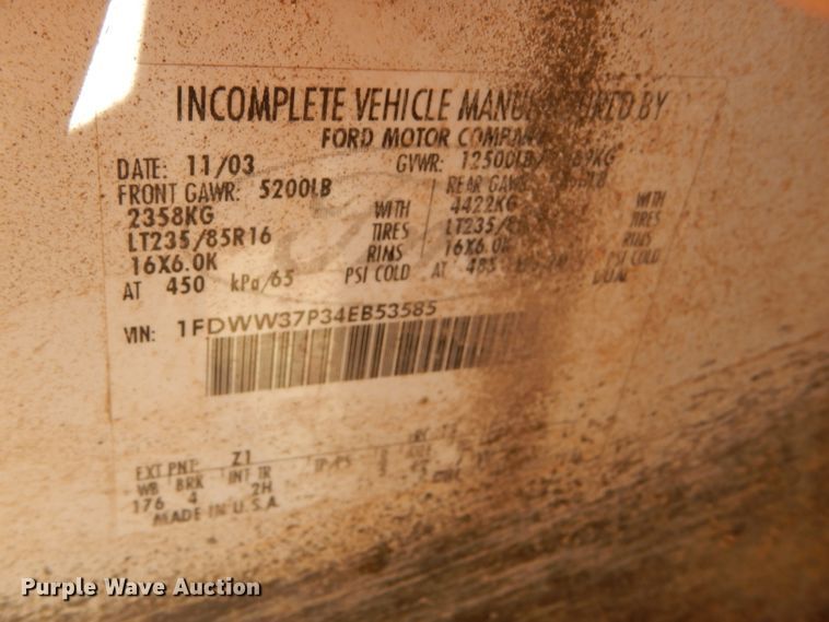 image for item FY9691 2004 Ford F350 Super Duty XLT Crew Cab utility bed pickup truck